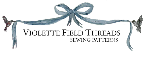 Violette Field Threads logo